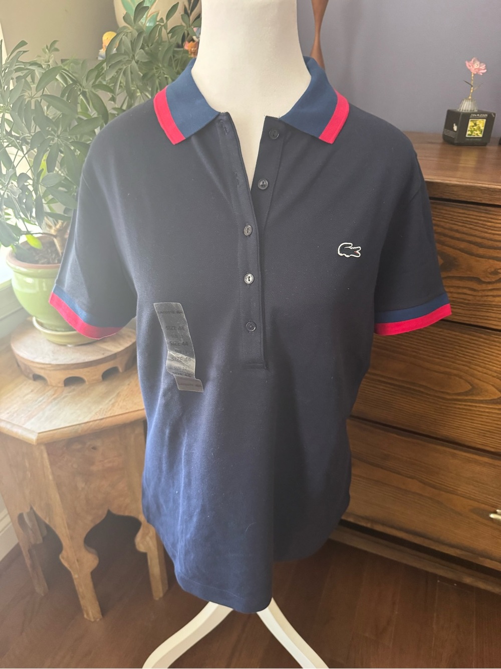 Lacoste Navy Polo with Pink Trim and Blue Collar Accents